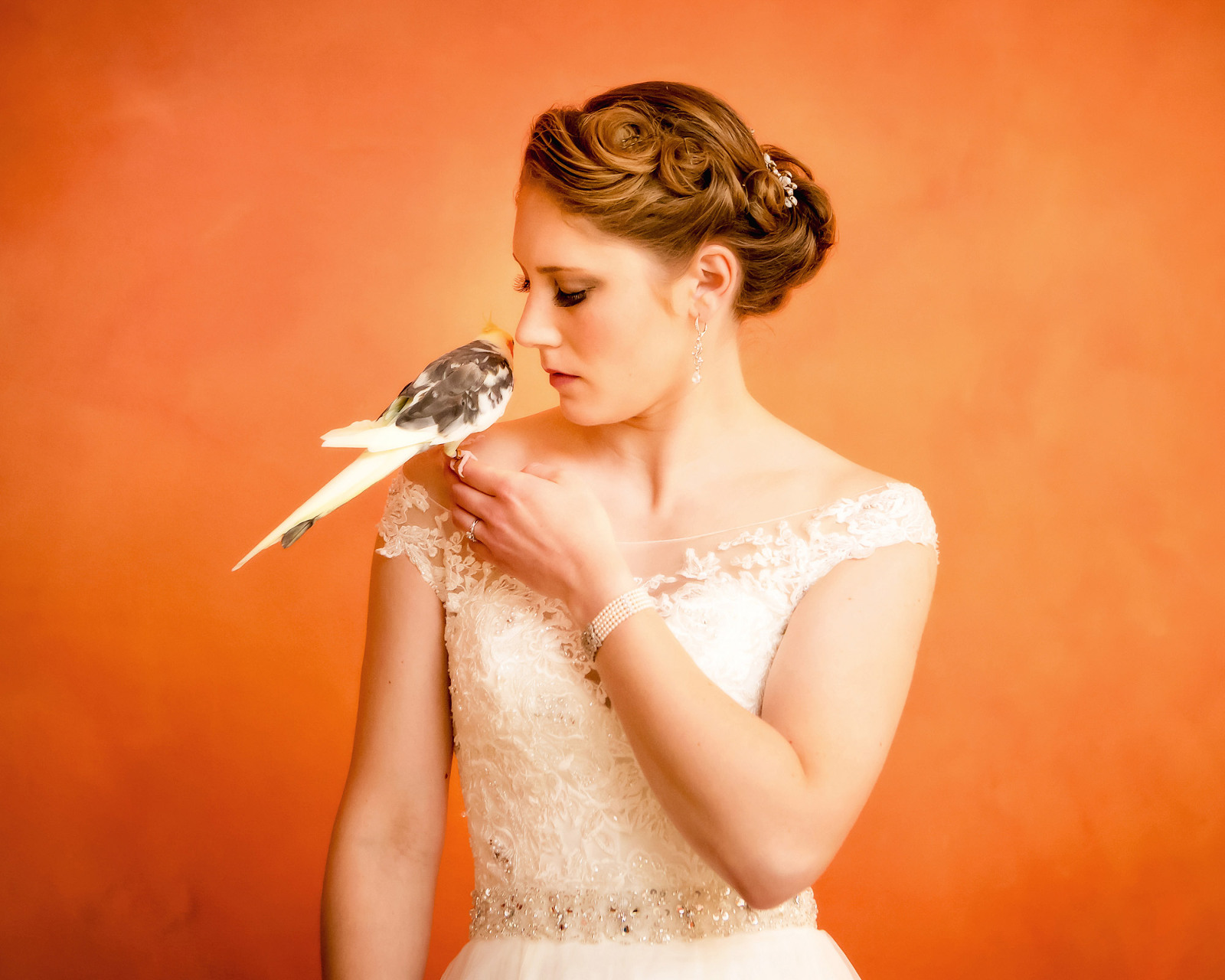 Bride holding bird
